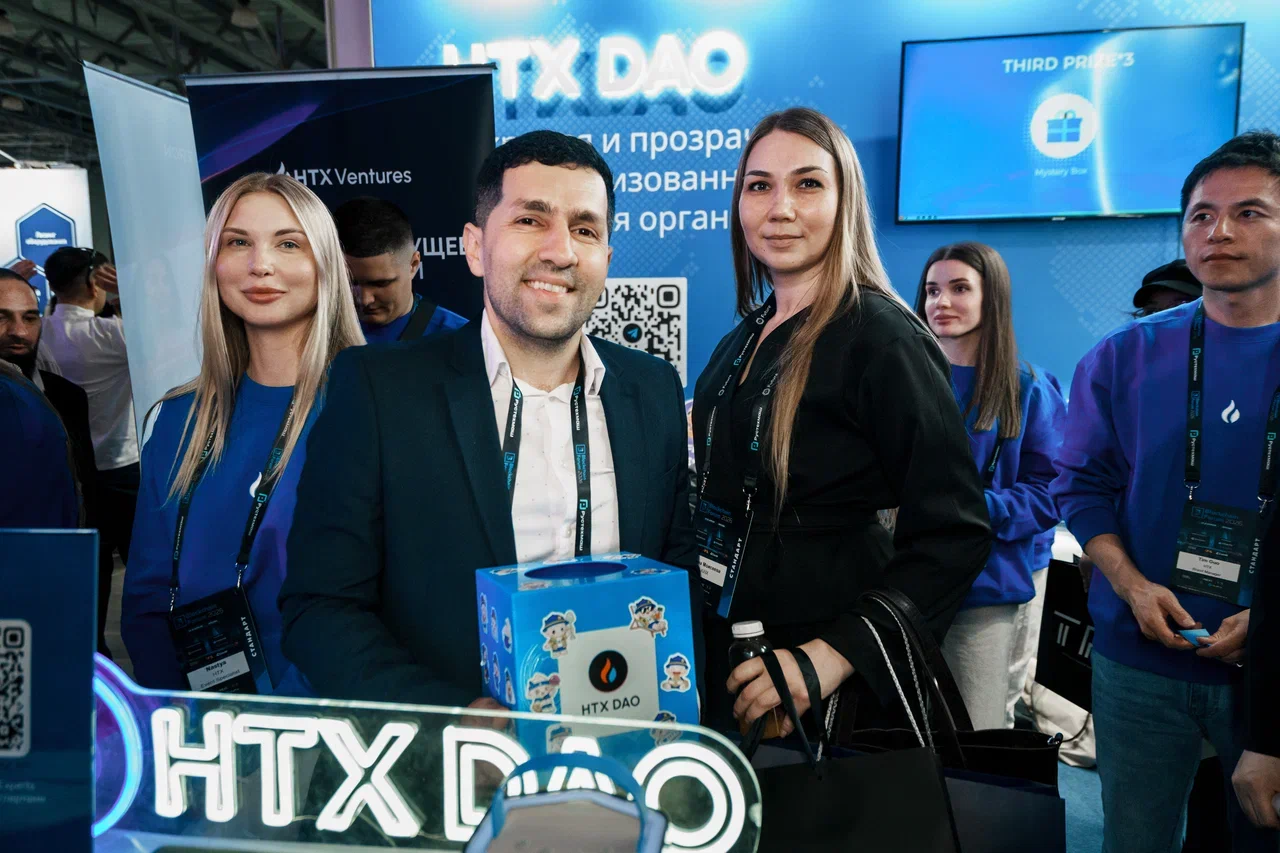 HTX DAO team at exhibition booth