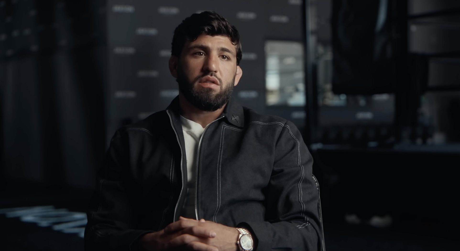 CEO interview portrait on a dark background